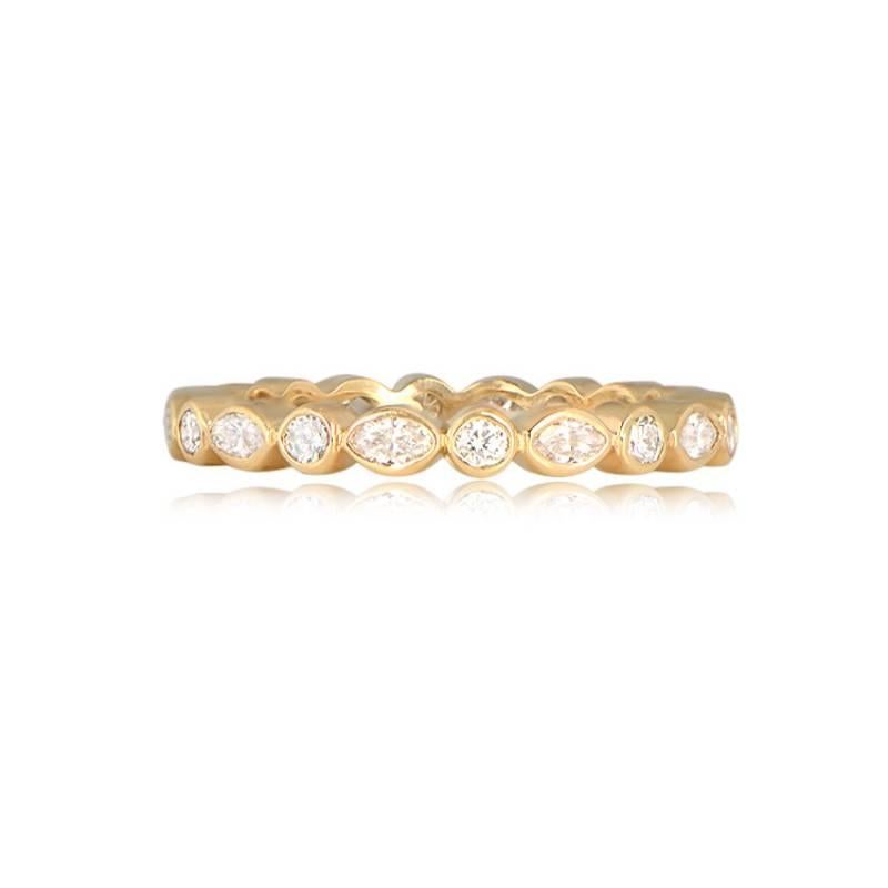 Crafted with precision, this 18k yellow gold eternity band is a masterpiece, showcasing a mesmerizing arrangement of alternating round brilliant cut and marquise cut diamonds. The total diamond weight is approximately 0.75 carats, and each diamond