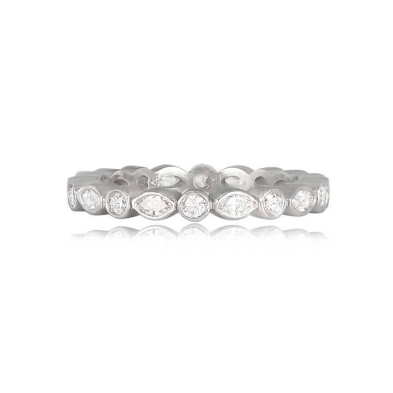The Eden band showcases an exquisite design with a continuous alternation of round brilliant cut diamonds and marquise diamonds. This hand-crafted platinum eternity band radiates timeless elegance.

A dazzling diamond band with an approximate total