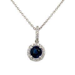 0.75ct Sapphire Surrounded by Diamonds on Chain in 18ct White Gold