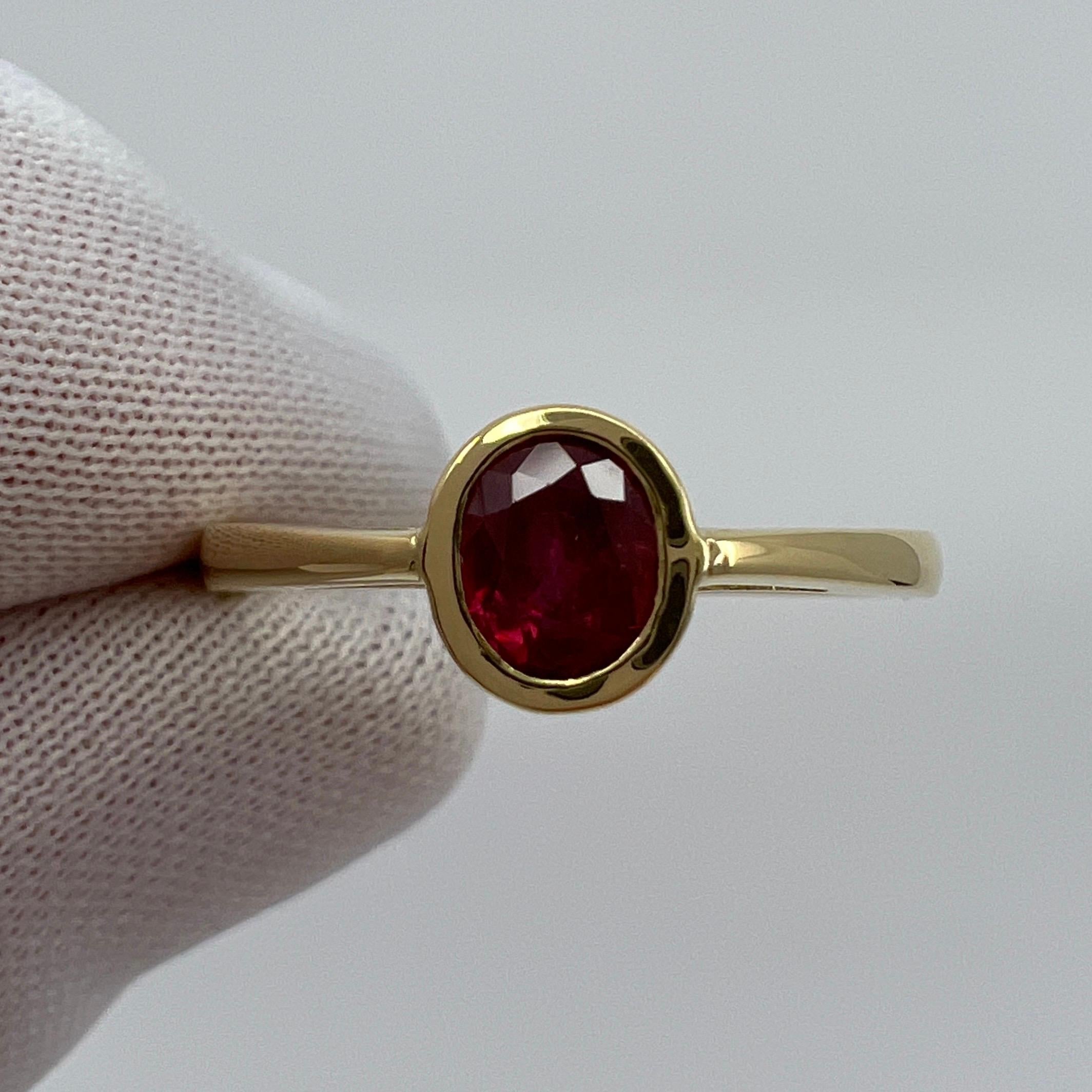 Women's or Men's 0.75ct Vivid Red Ruby Oval Cut 18k Yellow Gold Bezel Rubover Solitaire Ring For Sale
