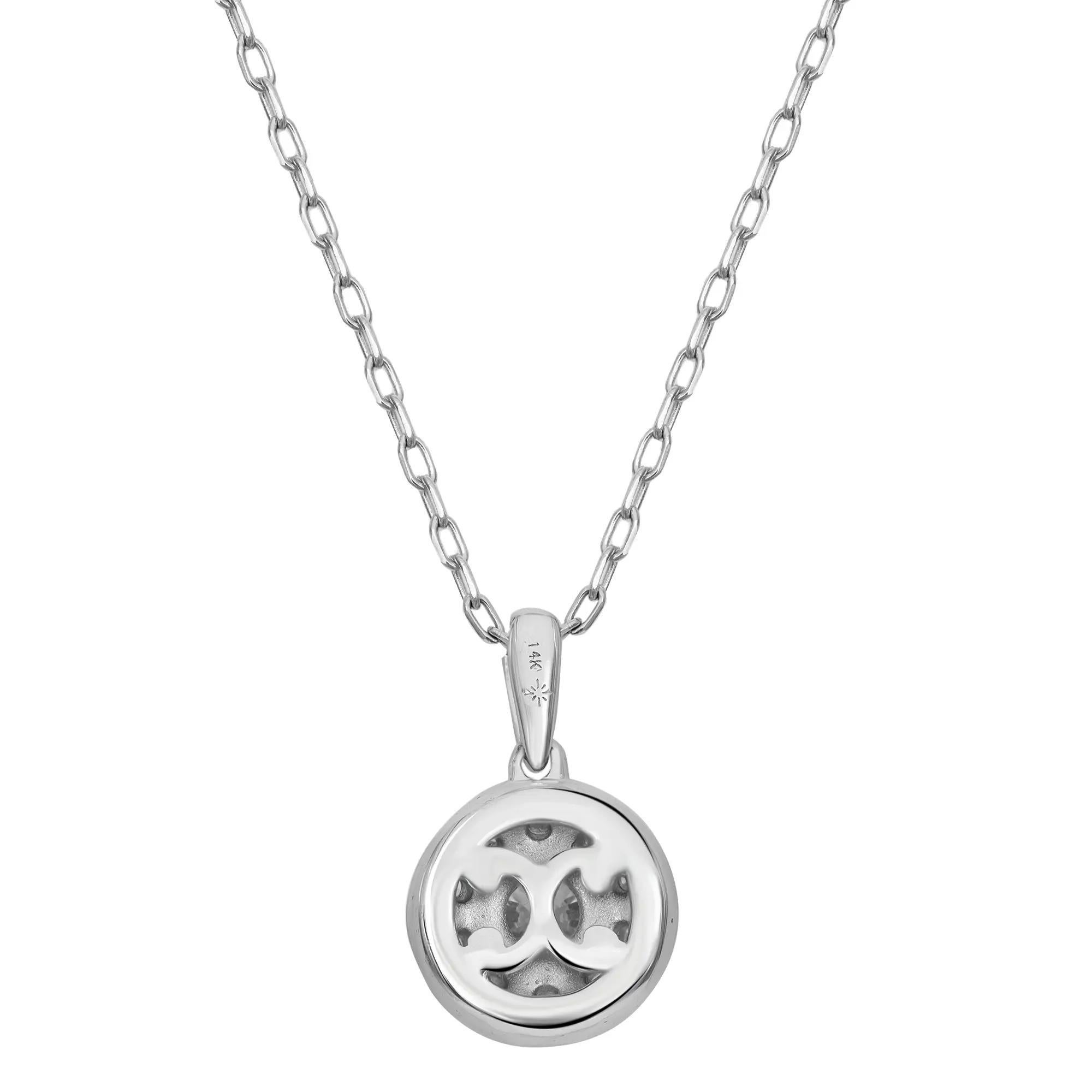 This beautiful diamond pendant necklace is a must have for your jewelry collection. Crafted in fine 14K white gold. It features a center prong set diamond weighing 0.50 carat with tiny diamonds in a halo setting giving an illusion of a bigger stone
