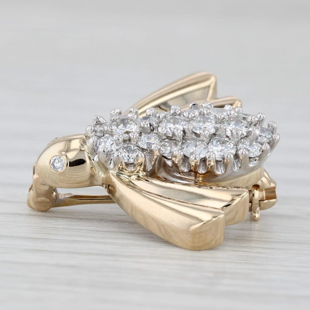 Informations sur les pierres précieuses :
- Diamants naturels -
Total des carats - 0.75ctw
Taille - Brilliante ronde
Couleur - F - G
Clarté - VS2 - SI1

Métal : Or jaune 14k
Poids : 4,3 grammes 
Timbres : 14k
Fermeture : épingle à barrettes, boucle