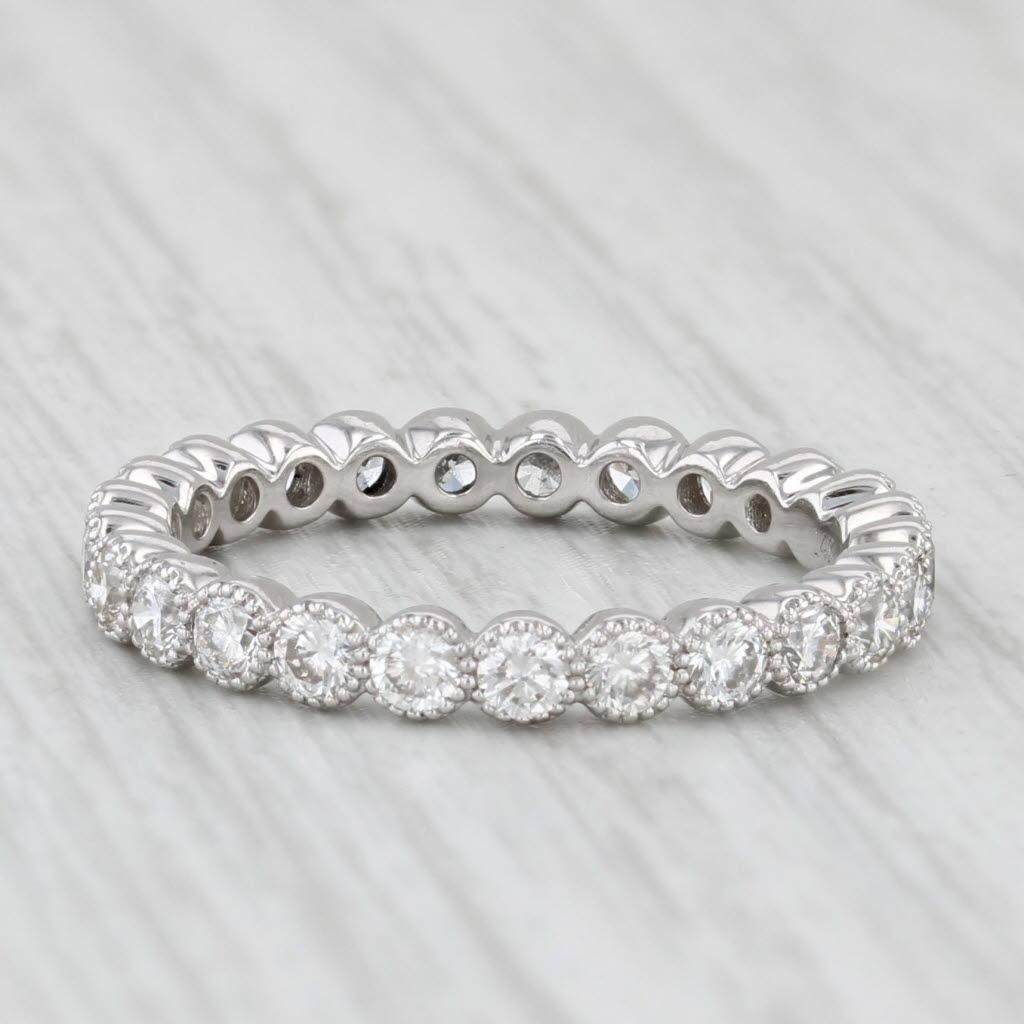 Gemstone Information:
- Natural Diamonds -
Total Carats - 0.75ctw
Cut - Round Brilliant
Color - F - G
Clarity - VS2 - SI1

Metal: 14k White Gold
Weight: 1.9 Grams 
Stamps: 14k
Rise Above Finger: 2.4 mm
Band / Shank Width: 2.7 mm

This ring is a size