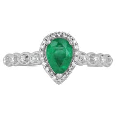 Anillo de compromiso con banda acentuada de diamantes y talla de pera y esmeralda colombiana de 14 quilates y 0,75 quilates