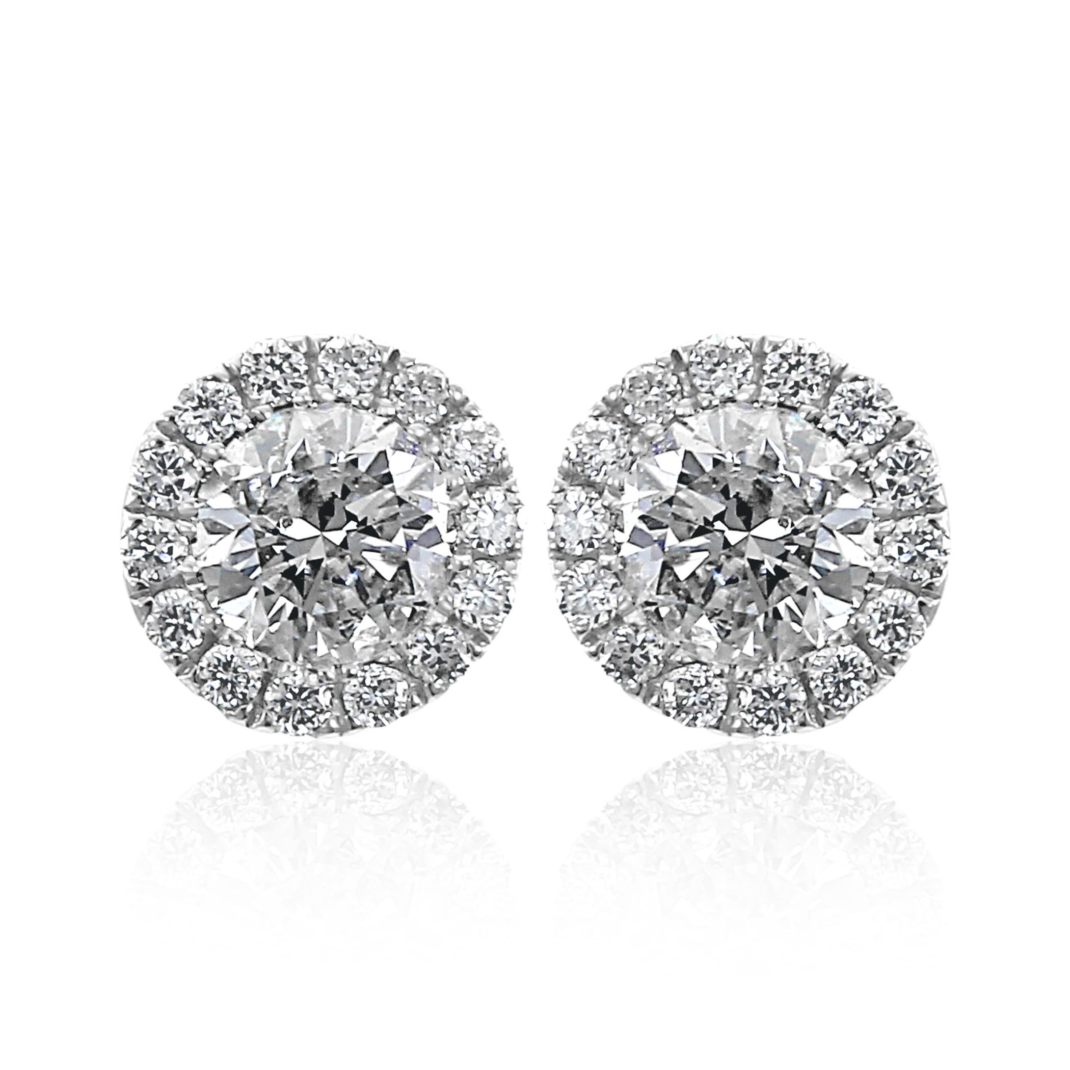 2 White G-H Color SI-I Eye clean Clarity Diamond Round 0.60 Carat Encircled in 28 White G-H Color SI Clarity Diamond Rounds 0.16 Carat set in Stunning 14K White Gold Classic yet Chic Everyday Wear Martini Style Stud Earrings.

Total Diamond Weight