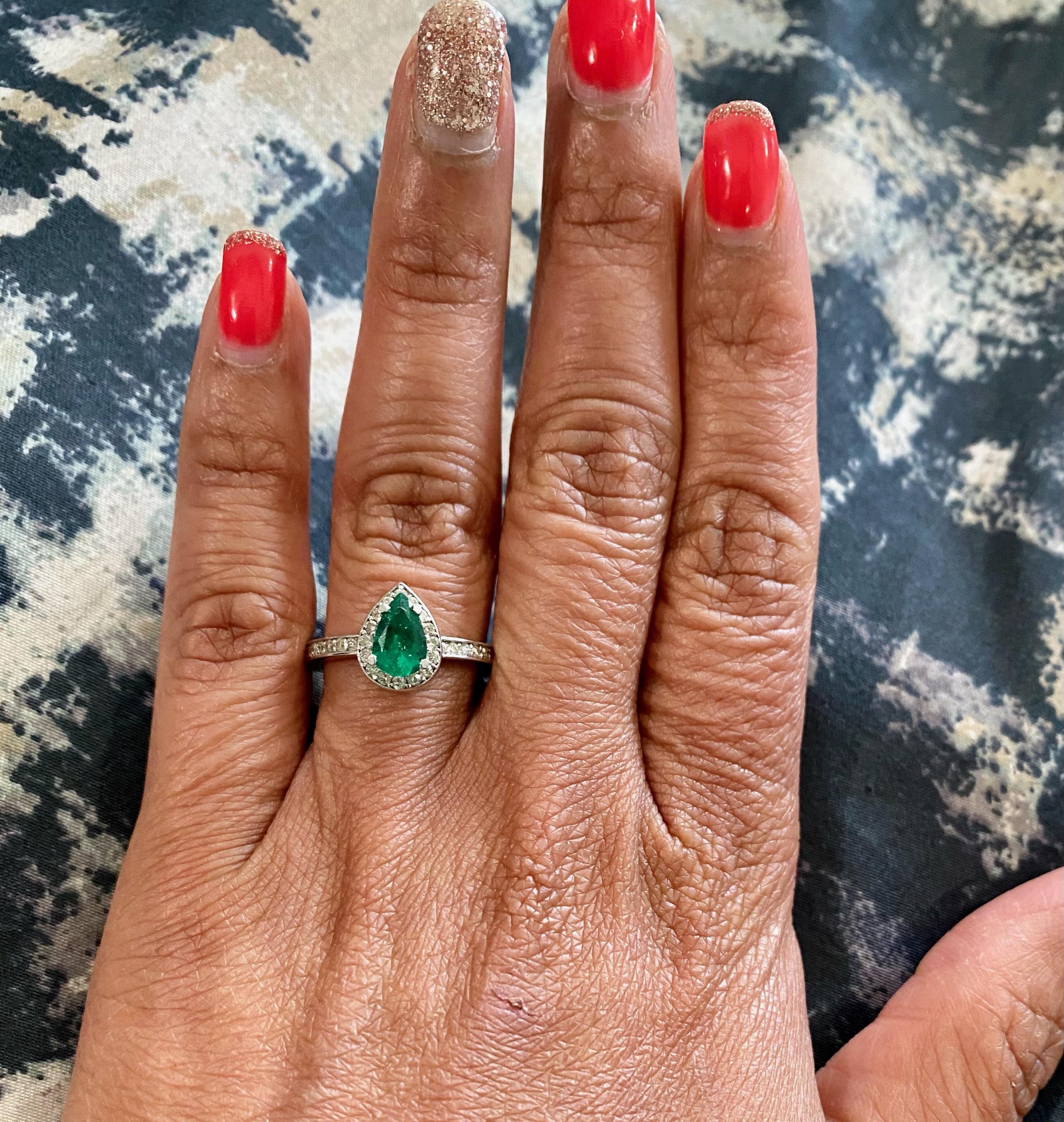 Modern 0.76 Carat Emerald Diamond Engagement 14 Karat White Gold Ring For Sale