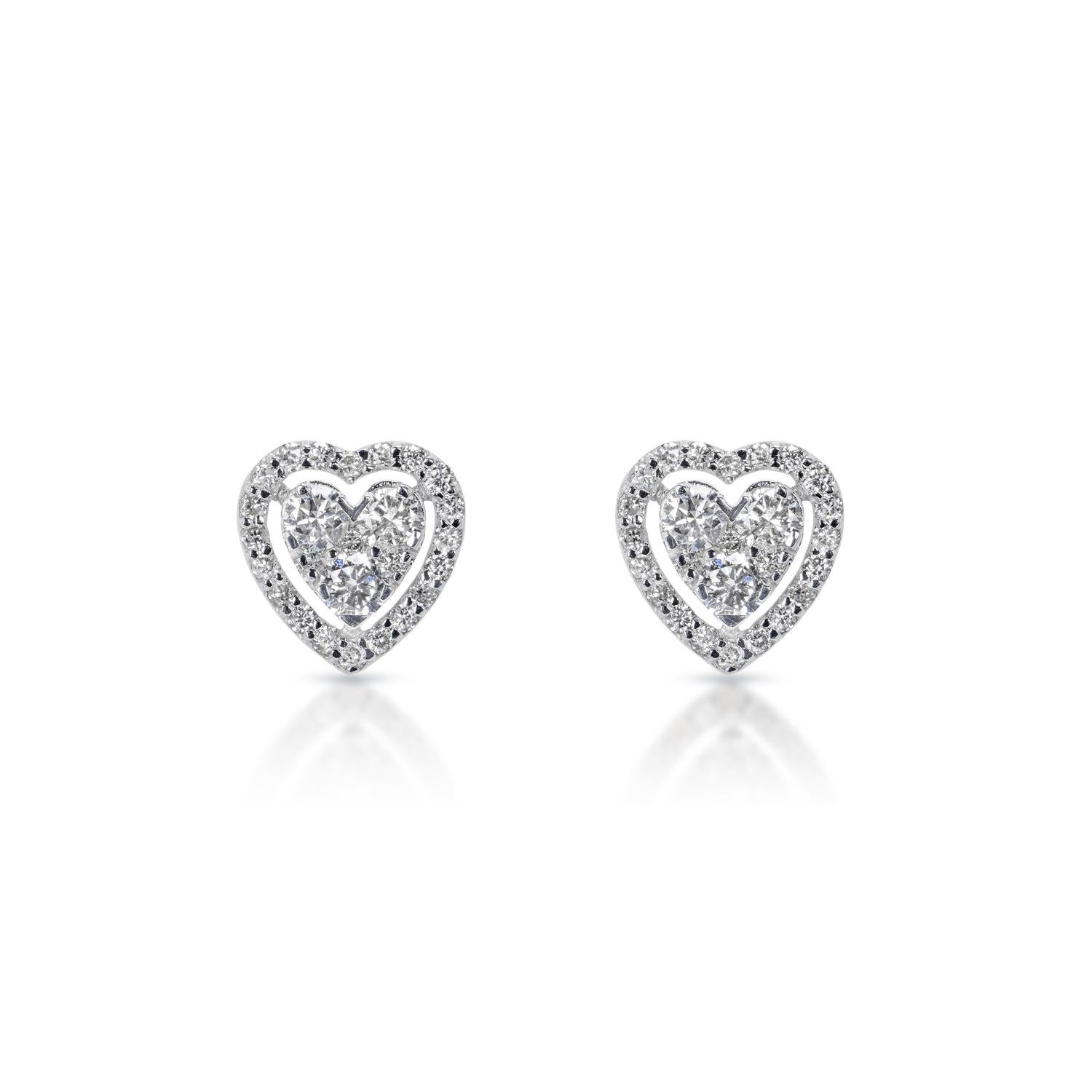 Heart Diamond Stud Earrings:

Carat Weight: 0.76 Carats
Shape: Round Brilliant Cut
Metal: 14 Karat White Gold
Style: Studs Earrings