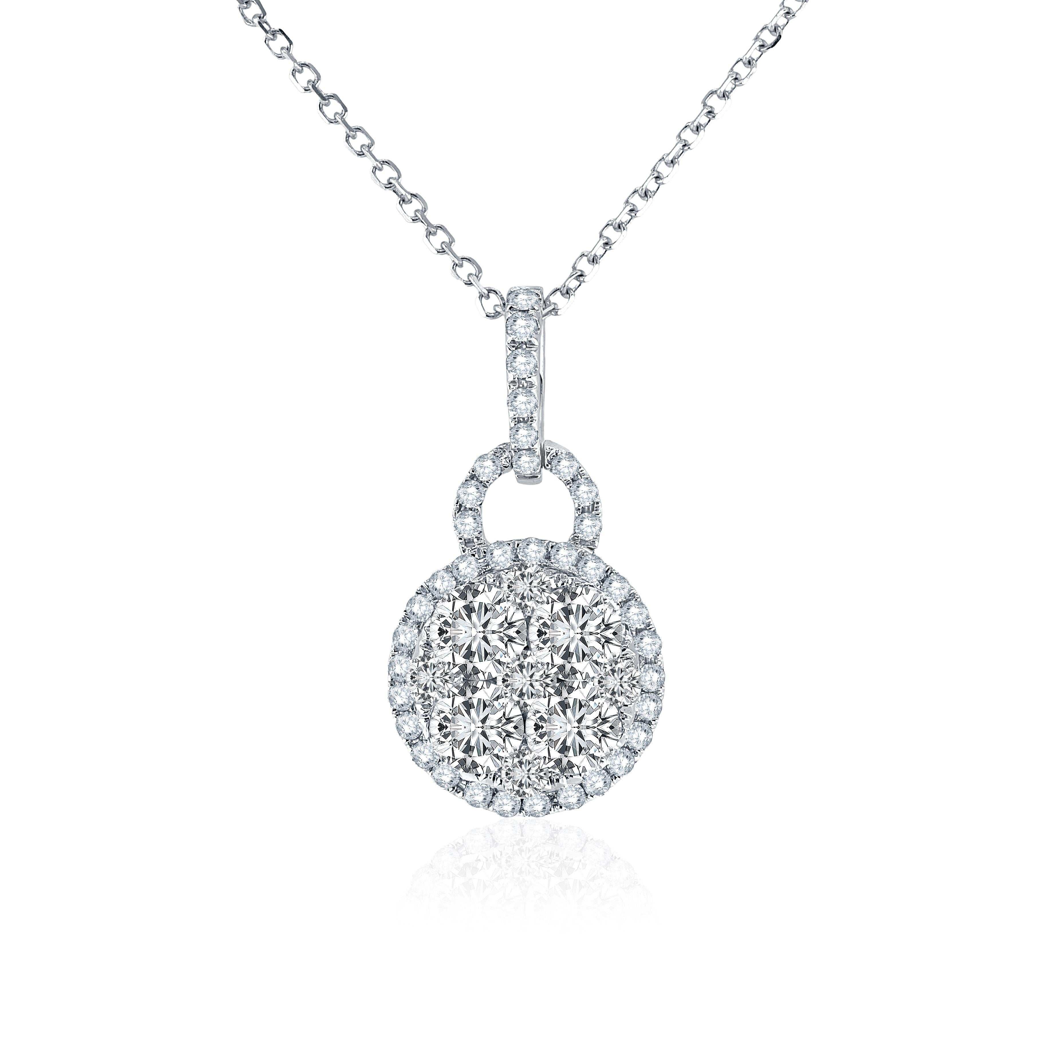 Elevate your elegance with this exquisite pendant, a testament to refined beauty. This delicate masterpiece showcases a cluster of natural round diamonds, encircled by a mesmerizing halo of smaller diamonds, with additional diamonds gracing the