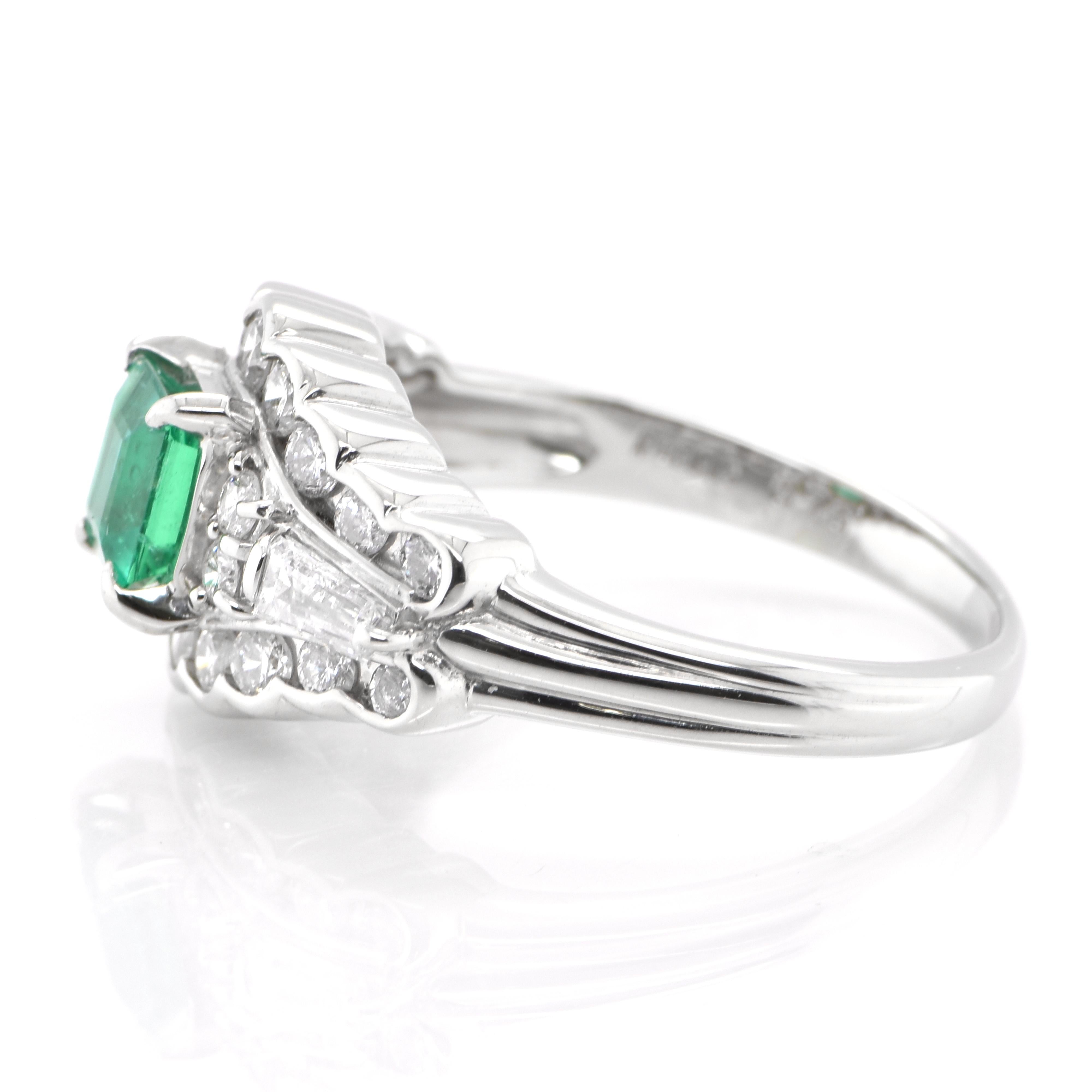 Emerald Cut 0.76 Carat Natural Emerald and Diamond Antique Ring Set in Platinum