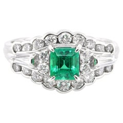 0.76 Carat Natural Emerald and Diamond Vintage Ring Set in Platinum