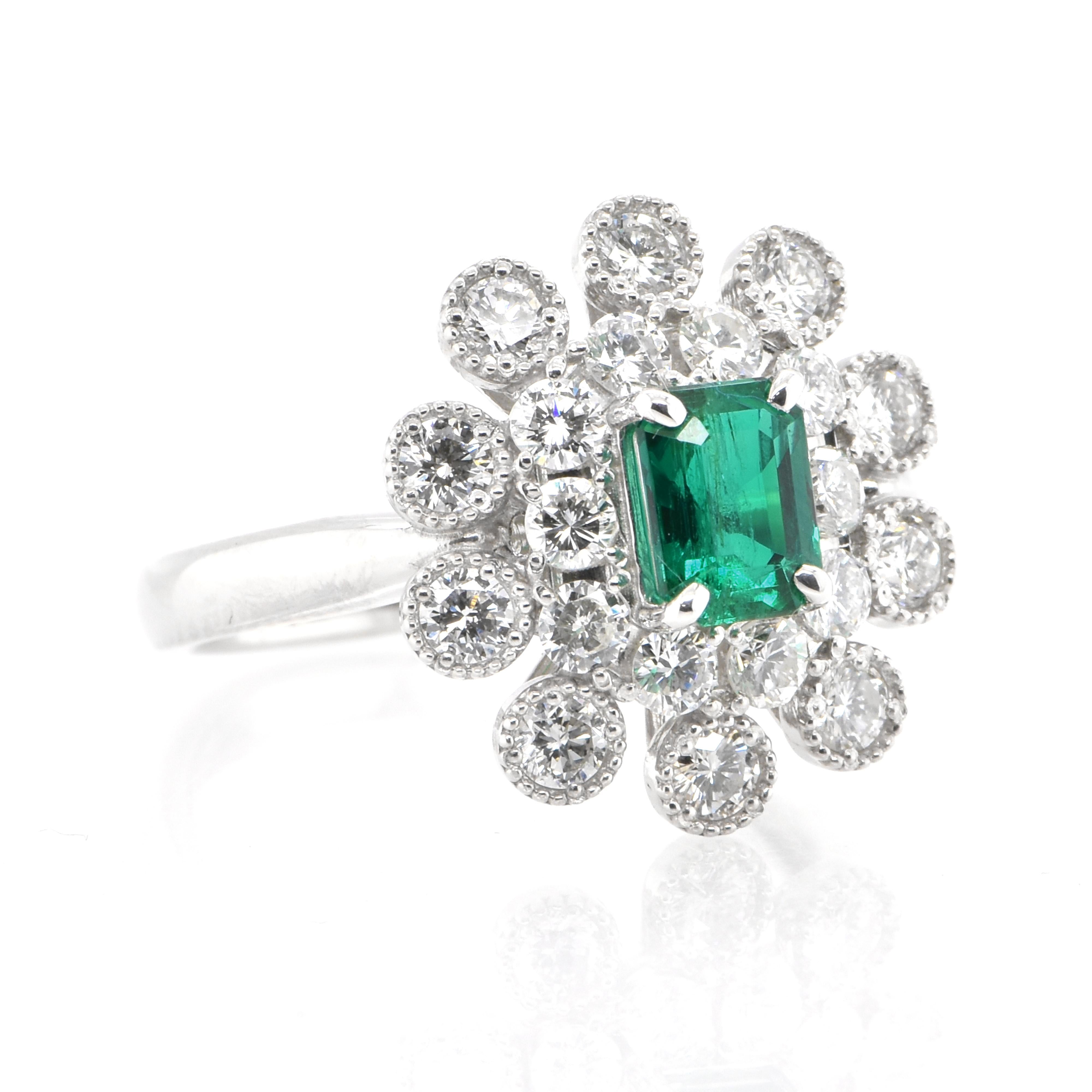 Modern 0.76 Carat Natural Emerald and Diamond Double Halo Ring Set in Platinum For Sale