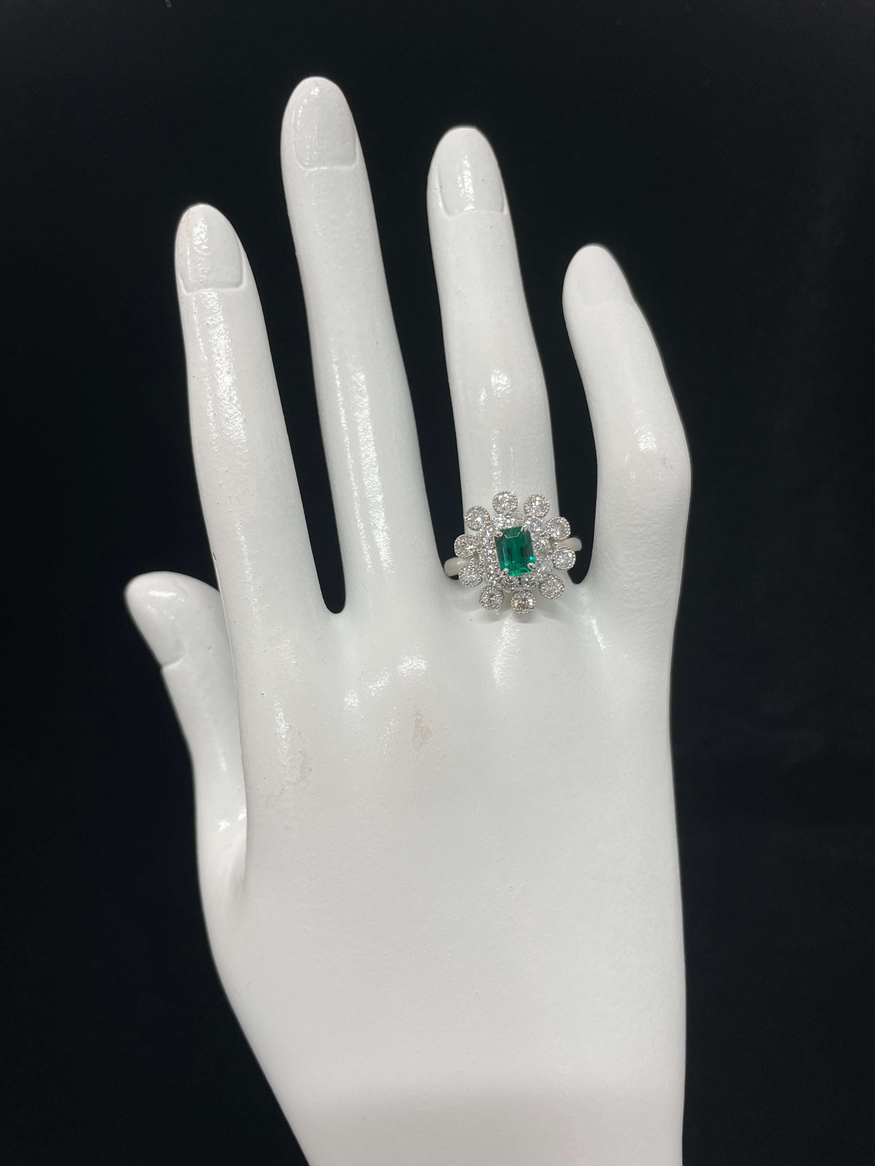 0.76 Carat Natural Emerald and Diamond Double Halo Ring Set in Platinum For Sale 1