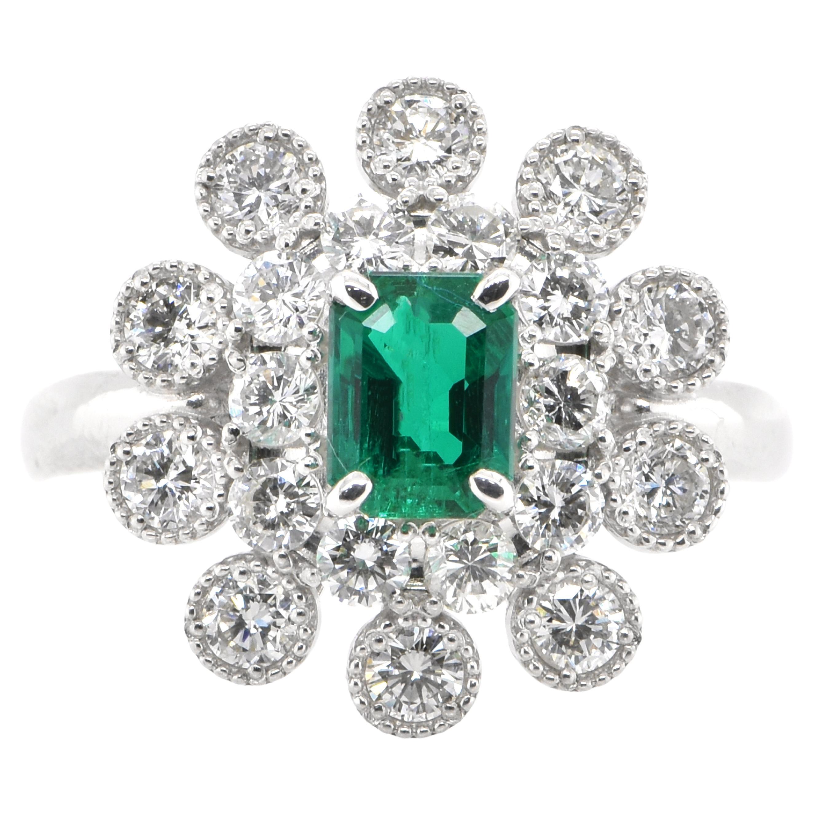 0.76 Carat Natural Emerald and Diamond Double Halo Ring Set in Platinum For Sale