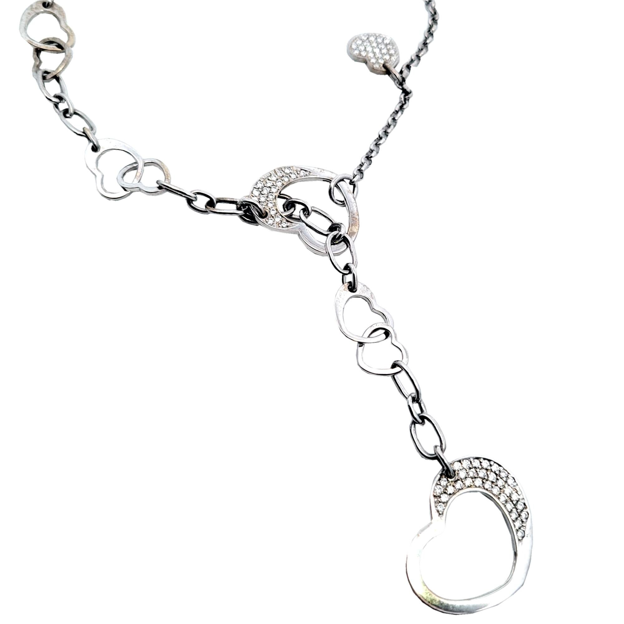 Round Cut 0.76 Carat Pave Set Diamond Dangling  Heart 14 Karat Necklace For Sale