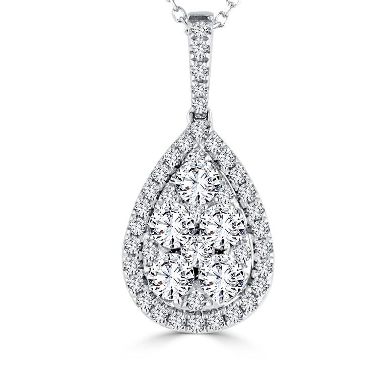This pendant features multiple closely set round diamonds to give the impression of a larger pear shape center. This is then surrounded by a halo of round white diamonds, with additional diamonds along the bail bringing the total carat weight to