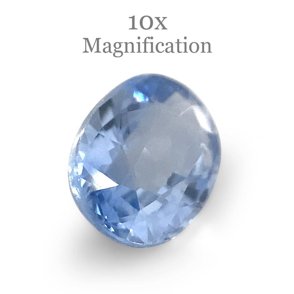 Women's or Men's 0.76ct Oval Icy Blue Sapphire from Sri Lanka Unheated For Sale