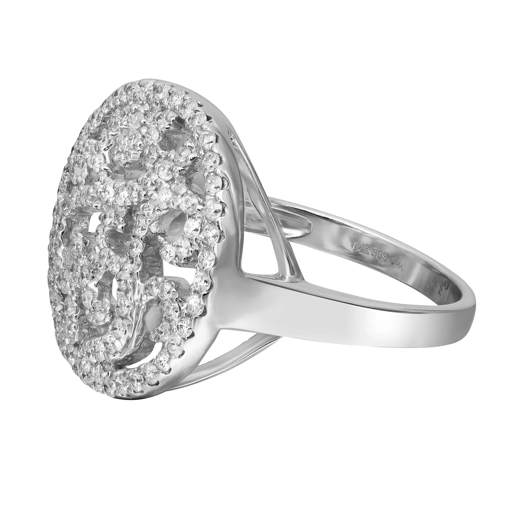 This bold and beautiful ring features prong set round cut diamonds set in a circular pattern. Total diamond weight: 0.76 carat. Diamond color I and SI1 clarity. Crafted in brightly polished 14k white gold. The ring size is 7.5 and the weight is 5.51
