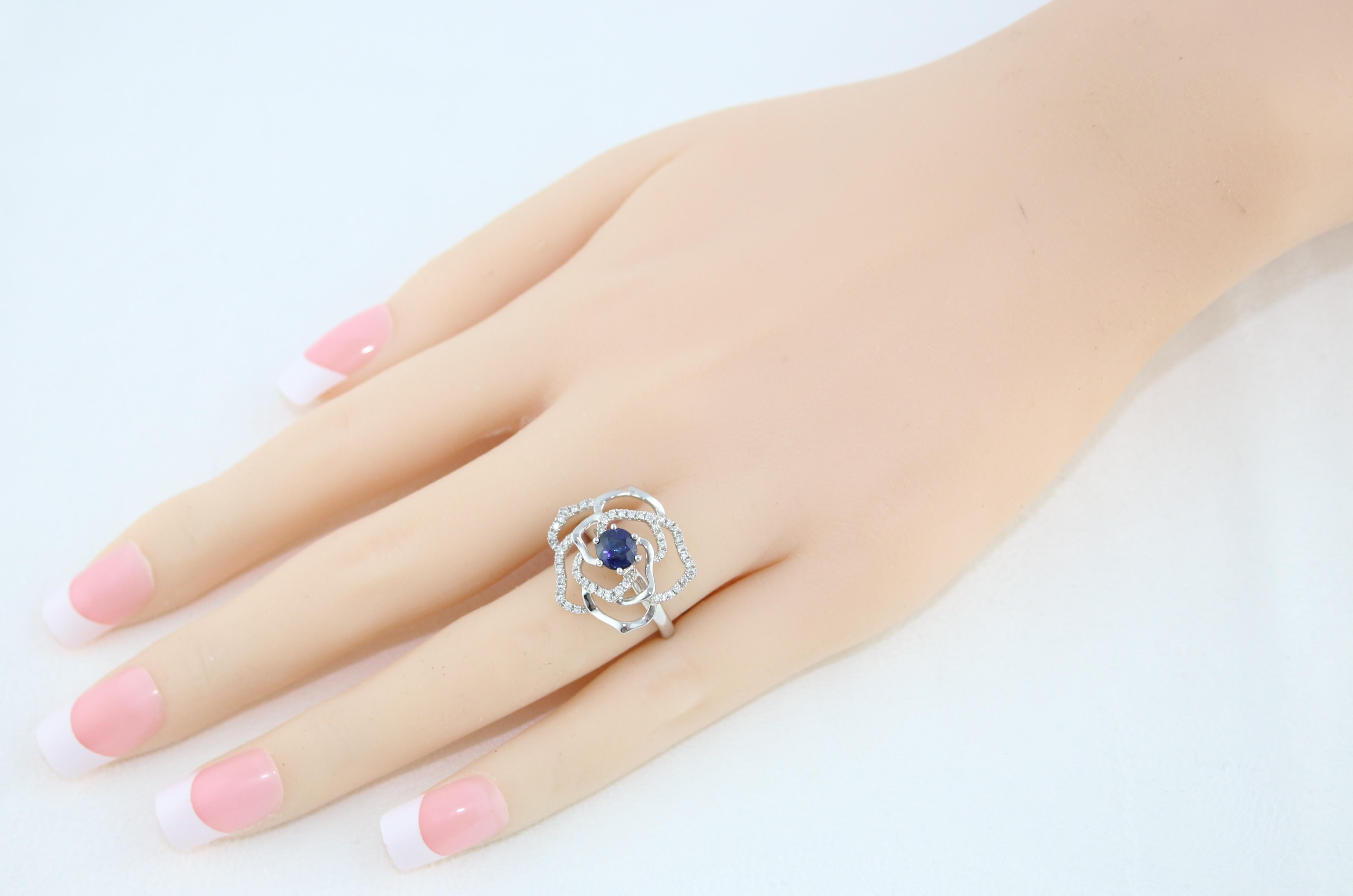 Women's 0.77 Carat Blue Sapphire Diamond Gold Flower Ring For Sale