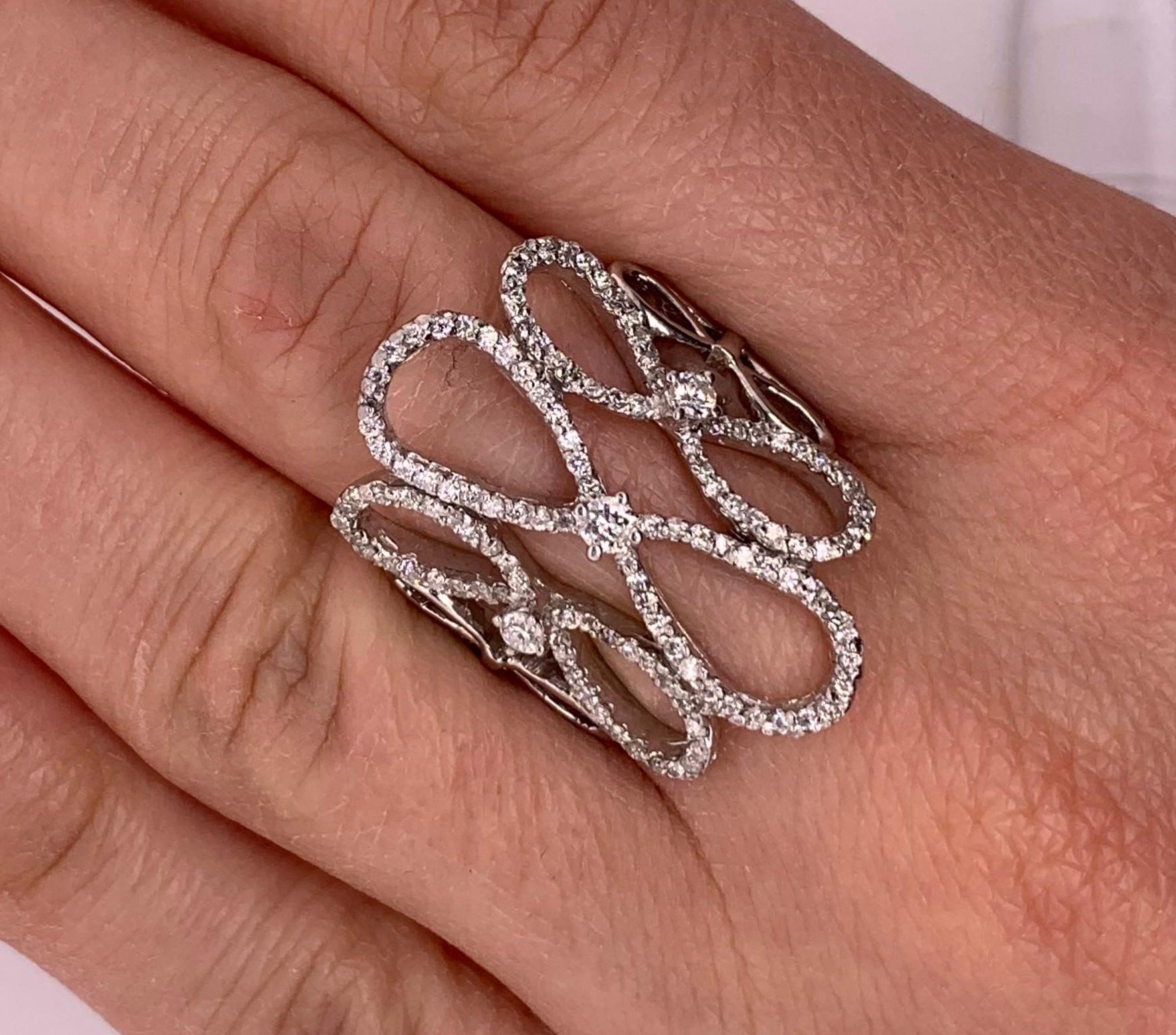 Material: 14k White Gold 
Diamonds: 127 Round White Diamonds at 0.77 Carats.  SI Clarity / H-I Color. 
Ring Size: 6. Alberto offers complimentary sizing on all rings.

Fine one-of-a kind craftsmanship meets incredible quality in this breathtaking