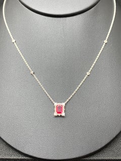 0.77 Carat Emerald Cut Ruby and Diamond Pendant Necklace in 18K White Gold