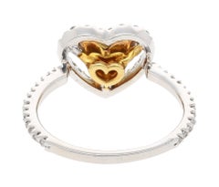 0.77 Carat Floating Fancy Yellow Heart Diamond & Diamond Halo Engagement Ring