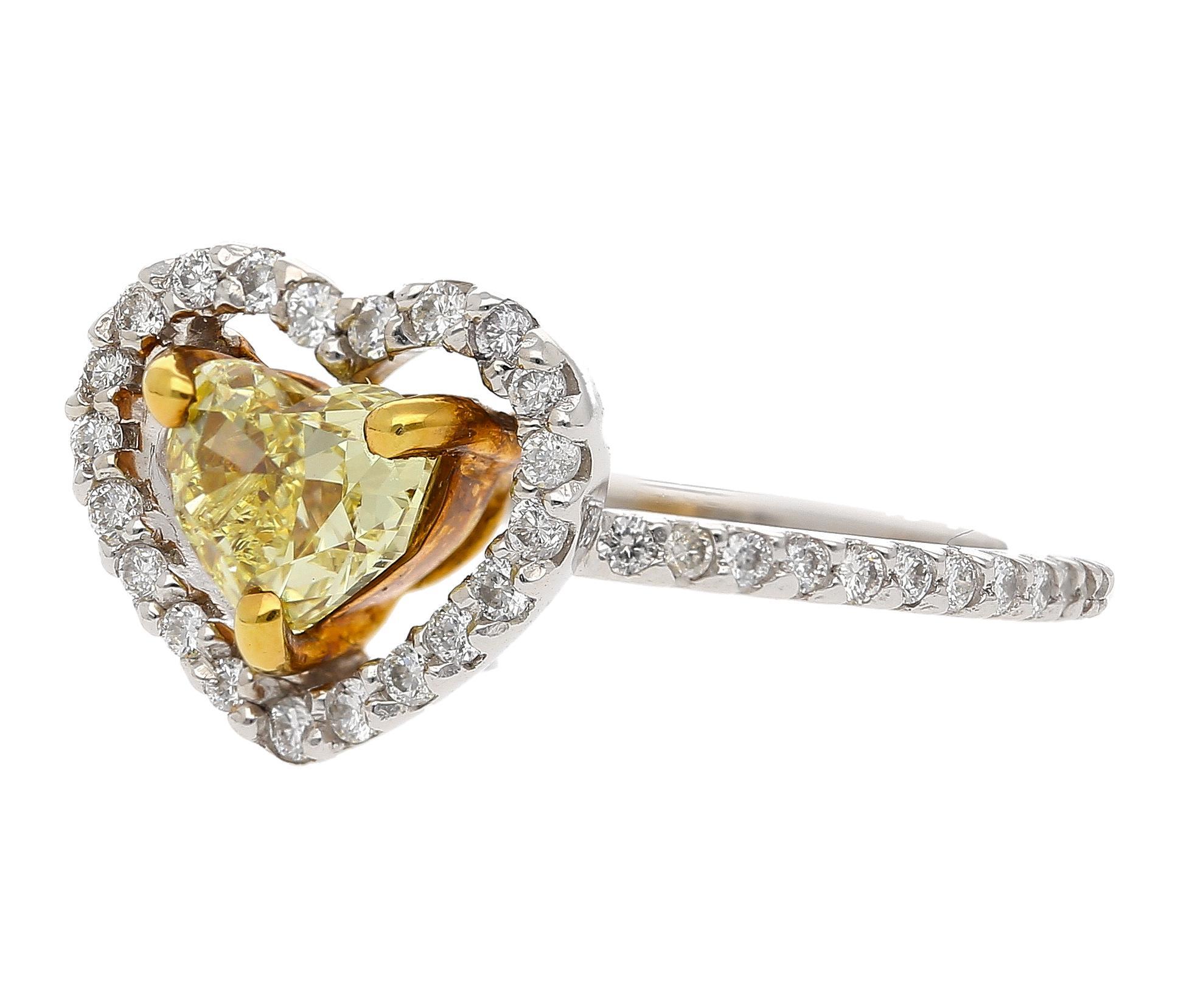 0.77 Carat Floating Fancy Yellow Heart Diamond & Diamond Halo Engagement Ring In New Condition For Sale In Miami, FL