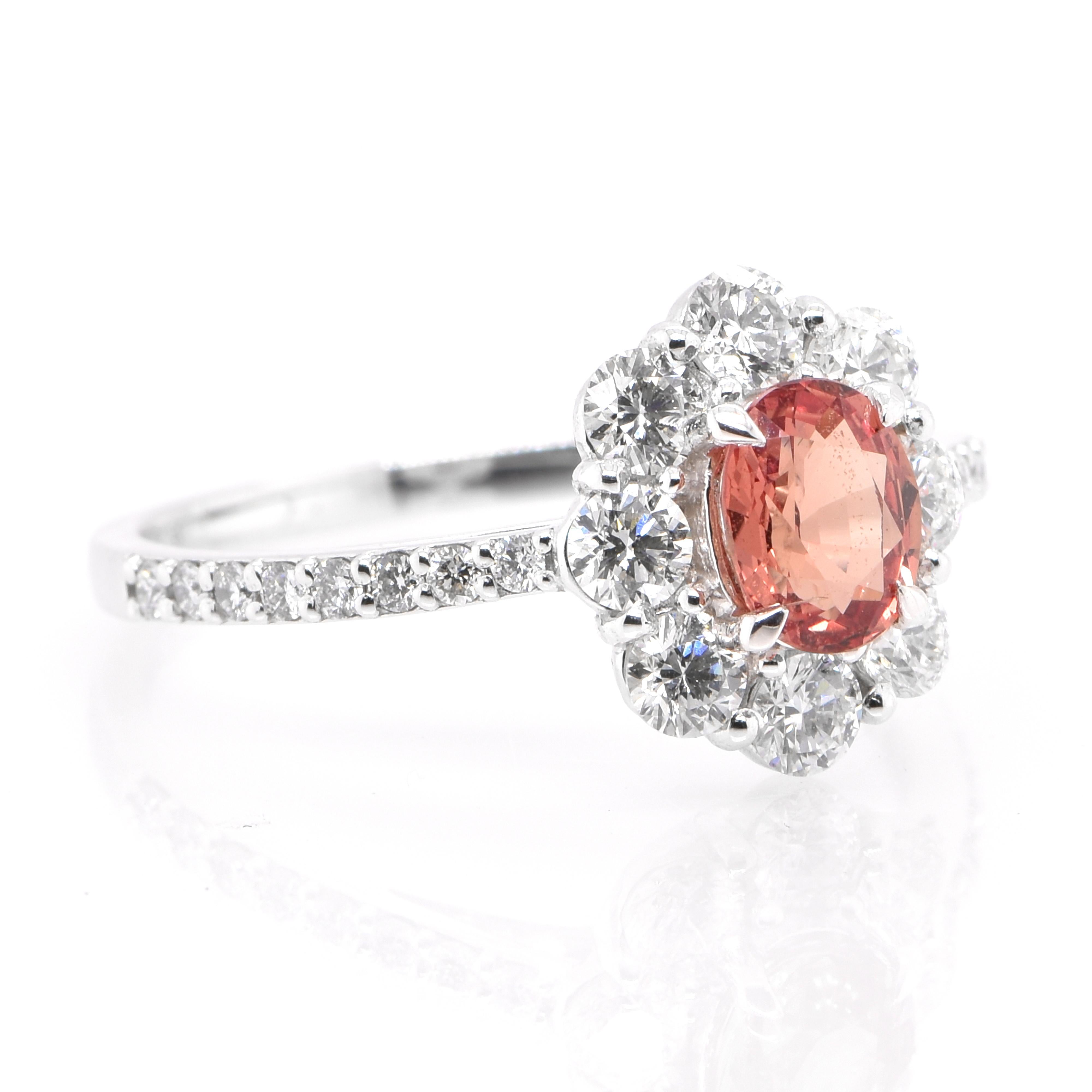 Modern 0.77 Carat Natural Padparadscha Sapphire and Diamond Ring Set in Platinum