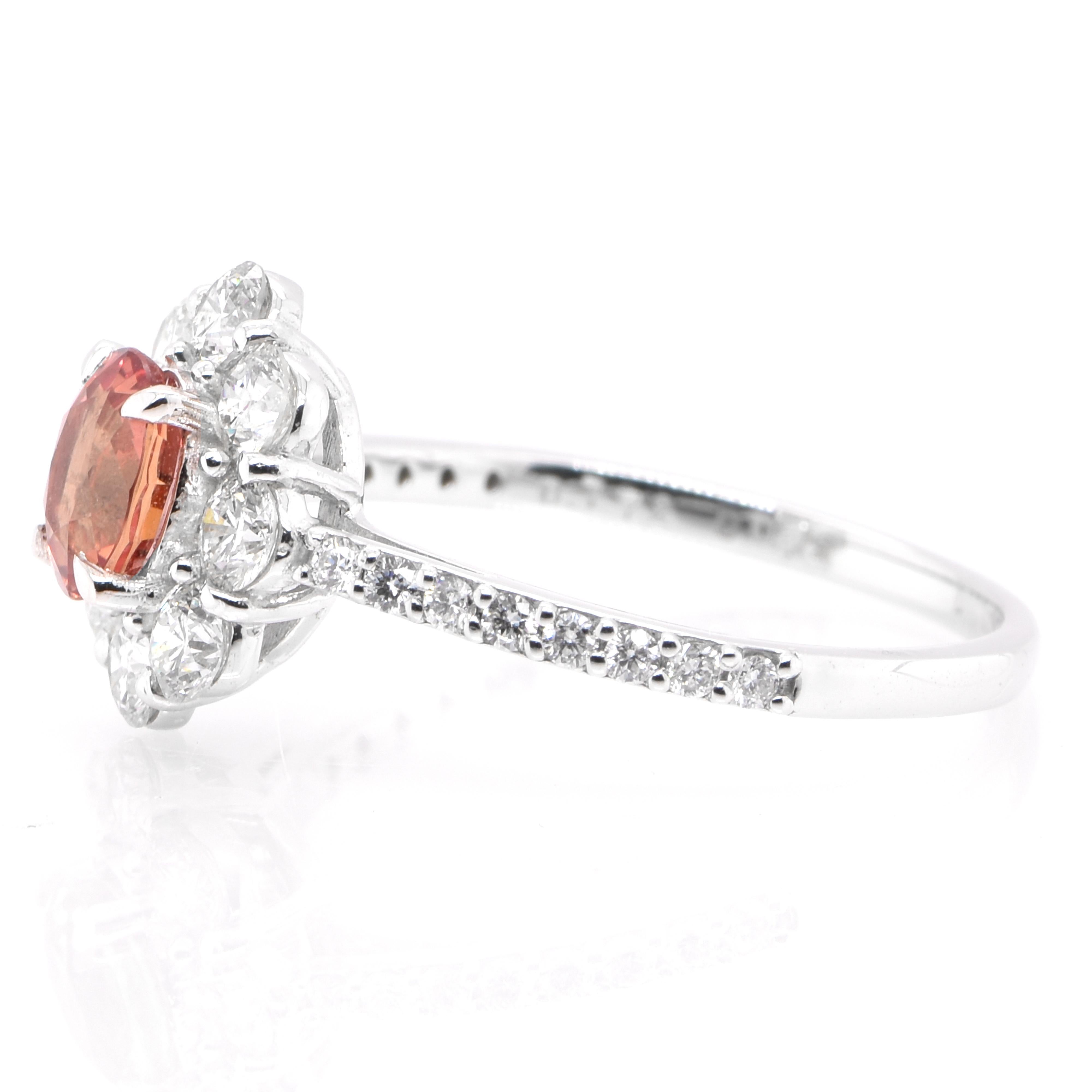 Oval Cut 0.77 Carat Natural Padparadscha Sapphire and Diamond Ring Set in Platinum