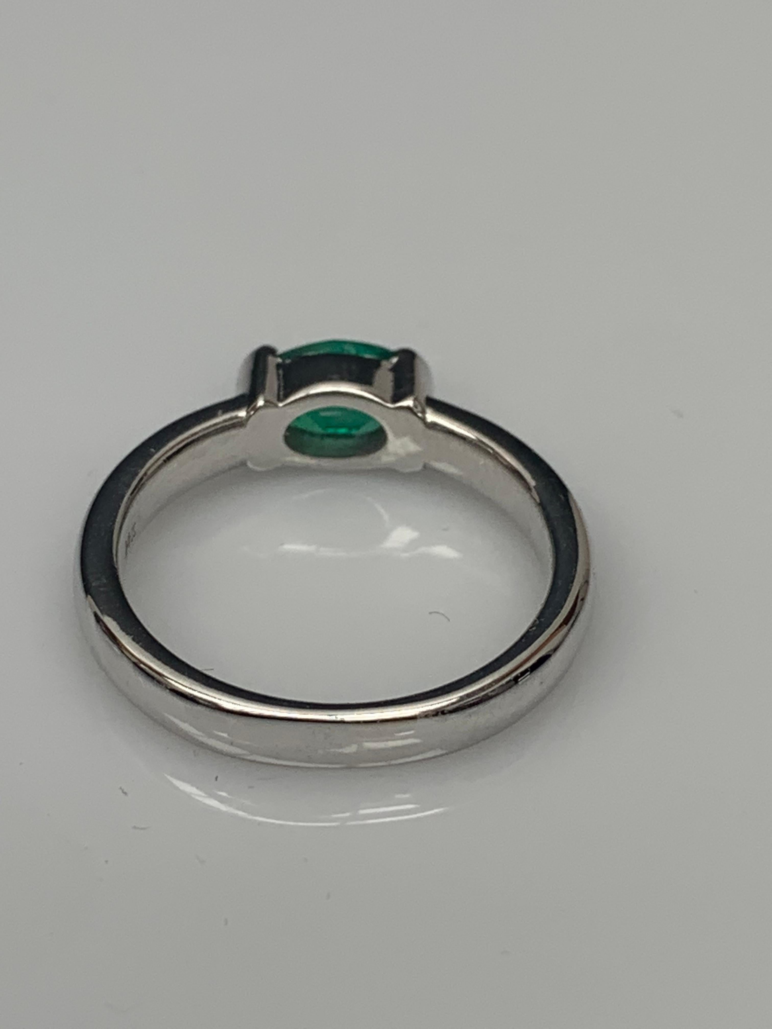 0.77 Carat Oval Cut Emerald Band Ring in 14K White Gold For Sale 8