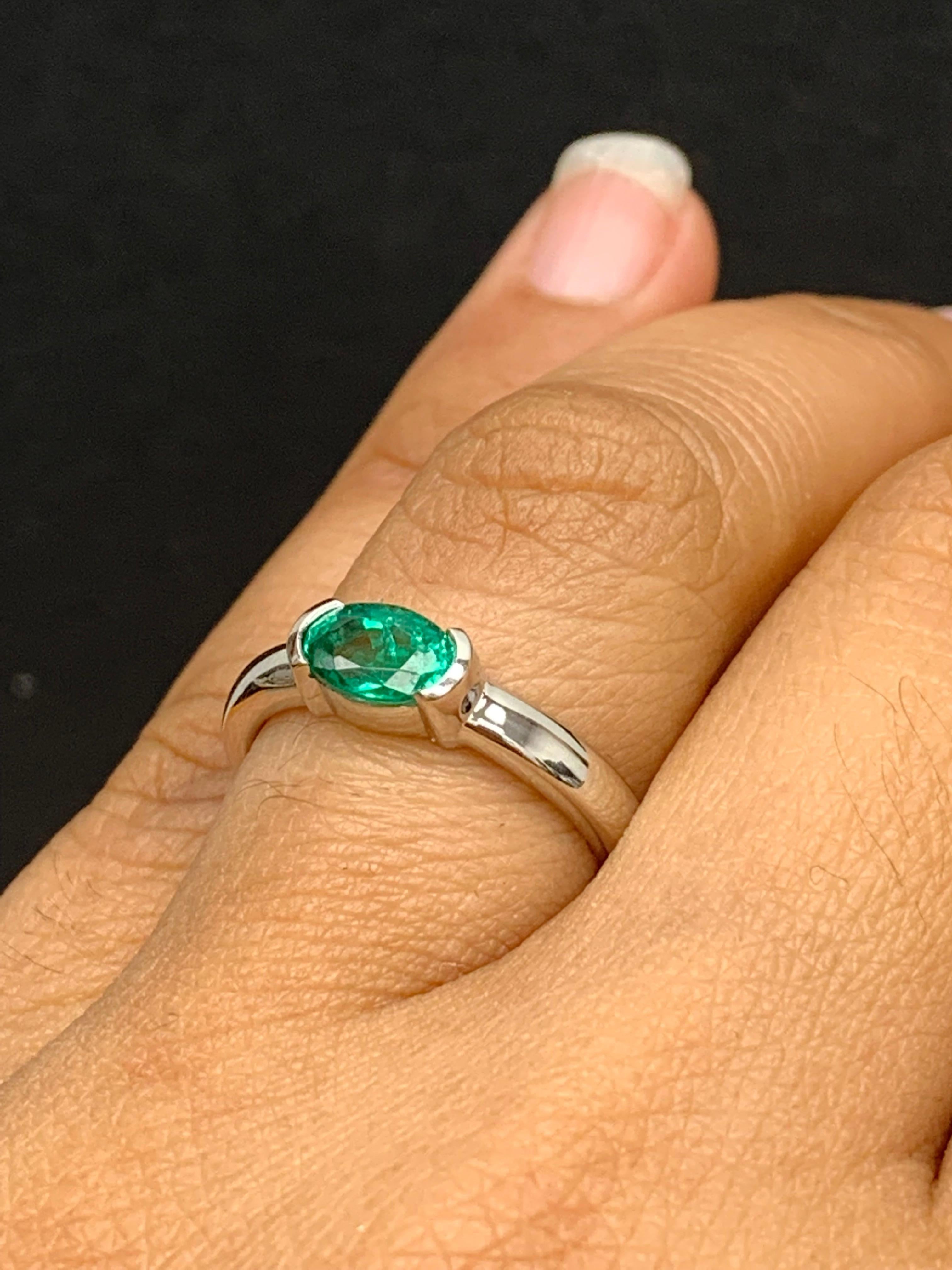 Women's 0.77 Carat Oval Cut Emerald Band Ring in 14K White Gold For Sale
