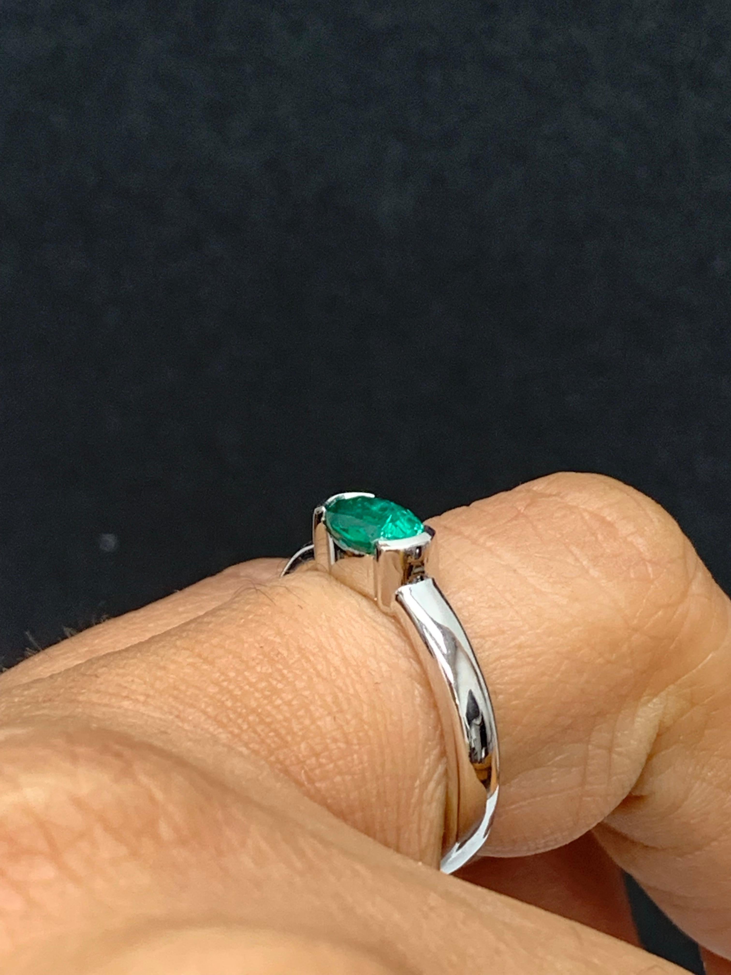 0.77 Carat Oval Cut Emerald Band Ring in 14K White Gold For Sale 1