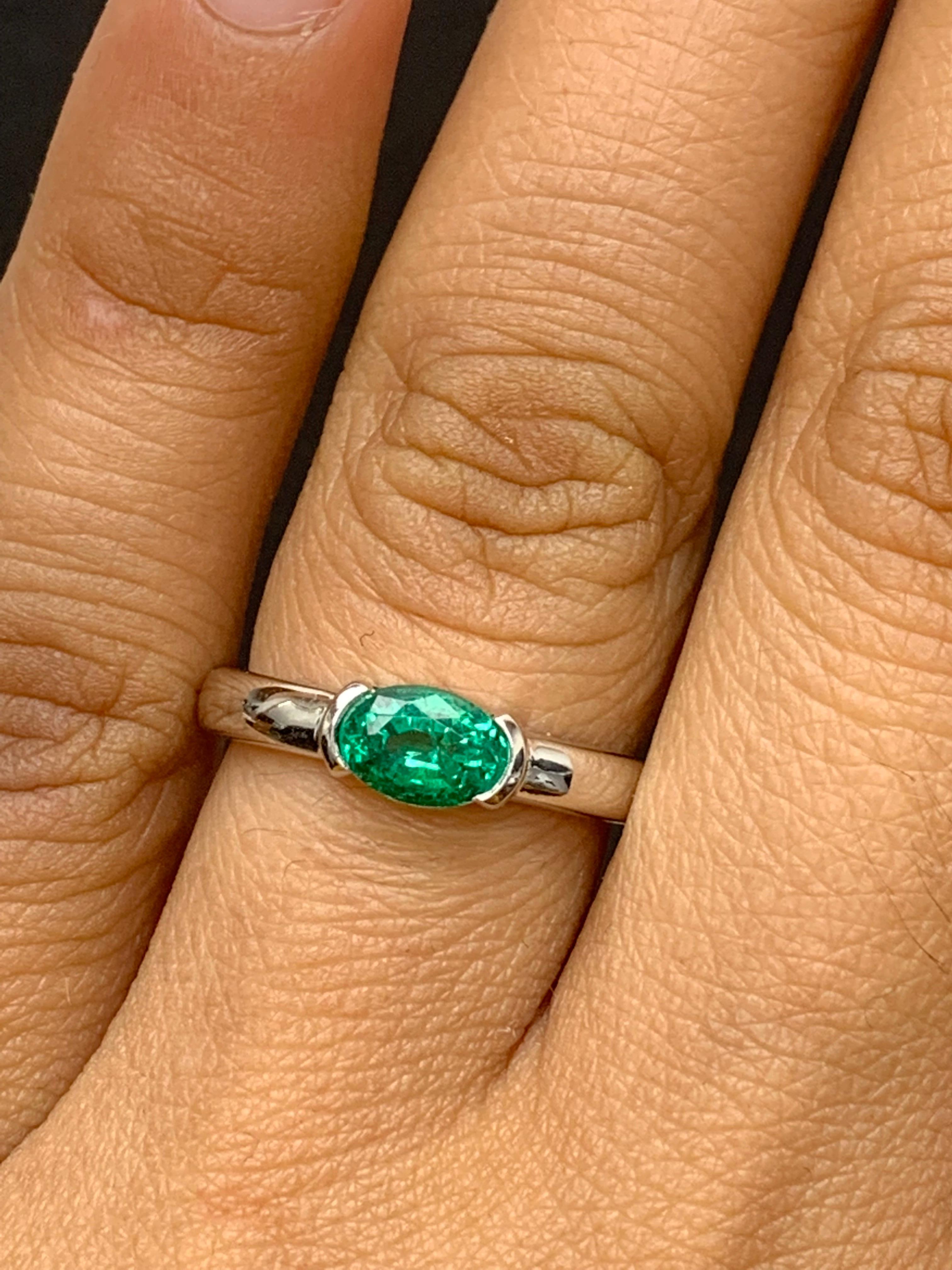 0.77 Carat Oval Cut Emerald Band Ring in 14K White Gold For Sale 4