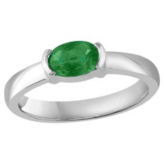 0.77 Carat Oval Cut Emerald Band Ring in 14K White Gold