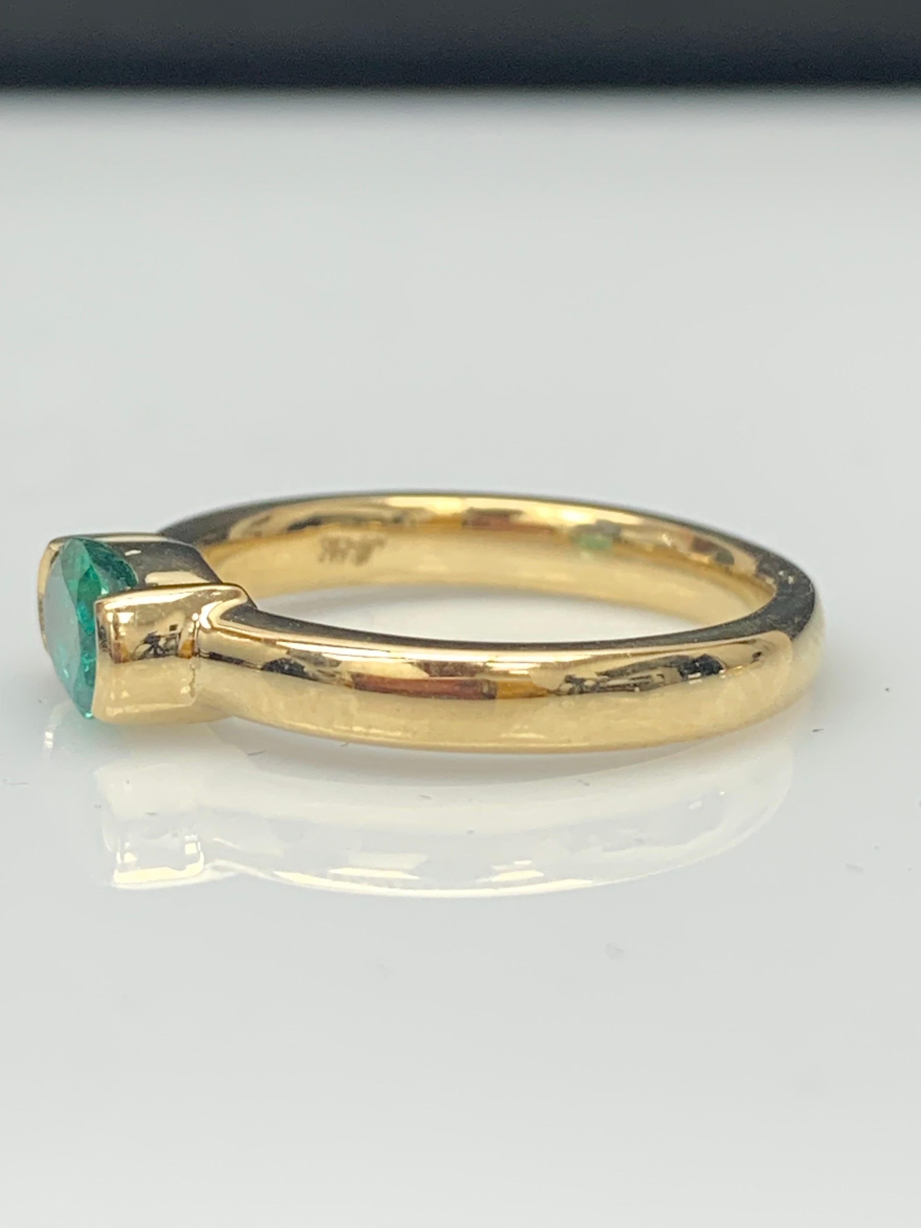 0.77 Carat Oval Cut Emerald Band Ring in 14K Yellow Gold For Sale 5