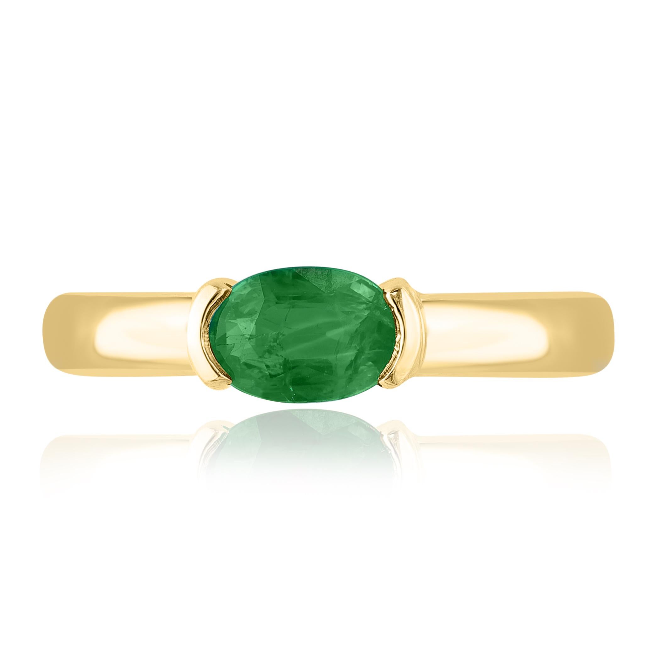 An elegant wedding band ring featuring an astonishing 0.77-carat oval cut emerald, set in a beautiful wide 14K Yellow gold band. 

Style is available in different price ranges. Prices are based on your selection. Don't hesitate to get in touch with
