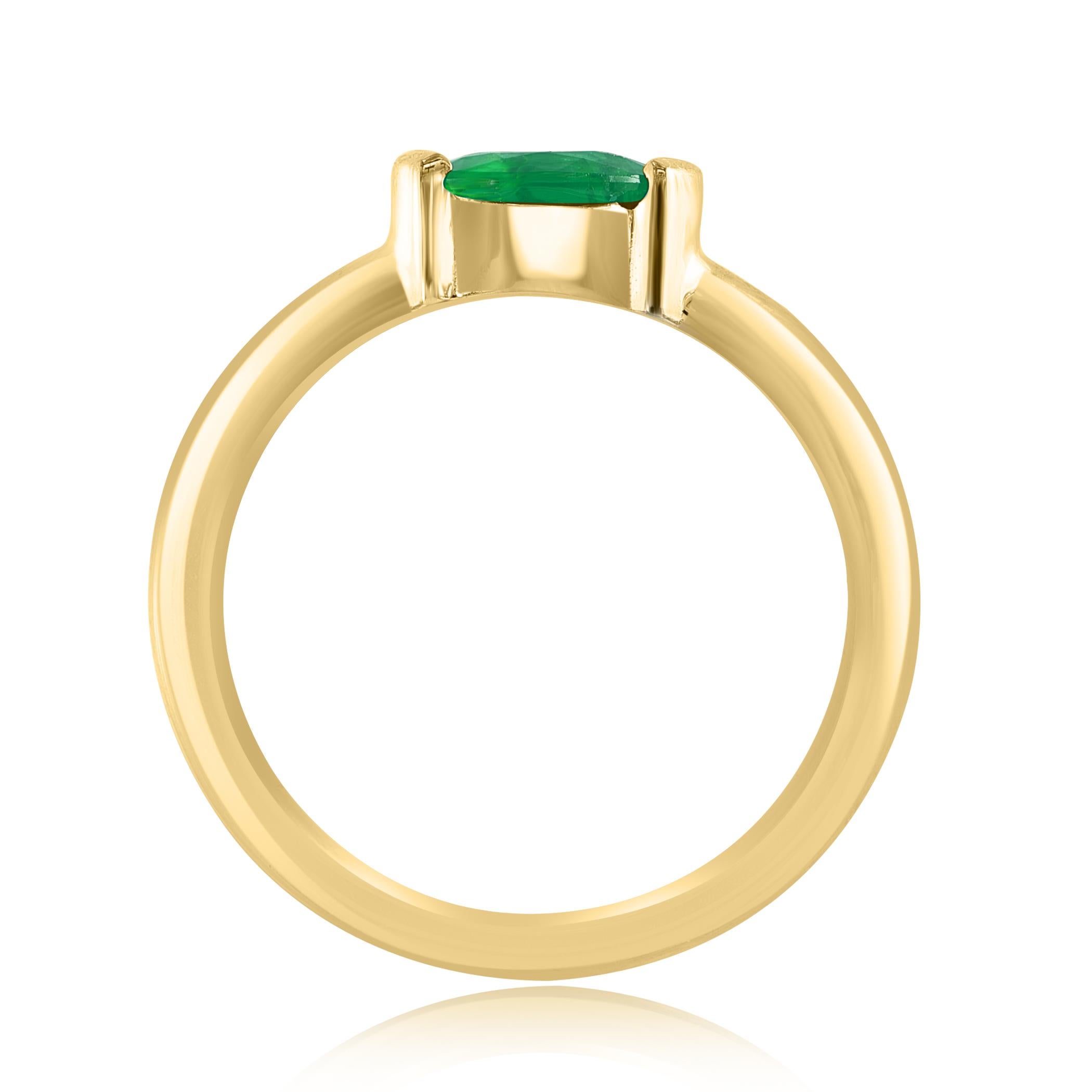 Modern 0.77 Carat Oval Cut Emerald Band Ring in 14K Yellow Gold For Sale