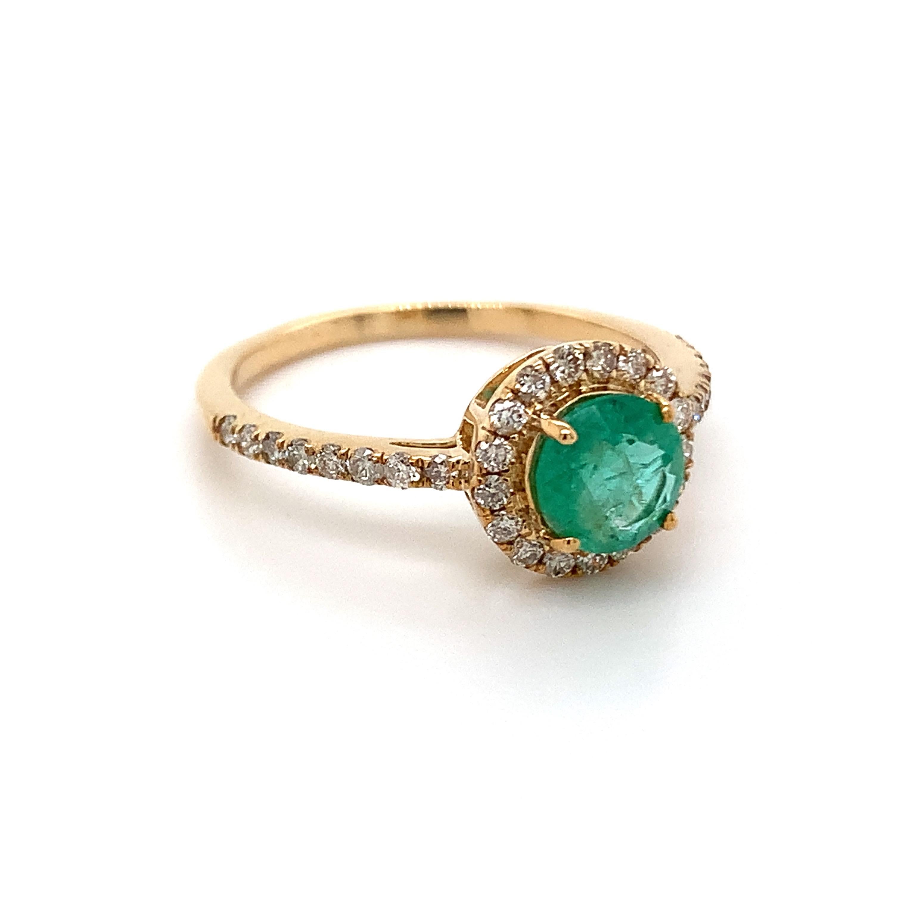Round shape emerald gemstone beautifully crafted in a 10K yellow gold ring with natural diamonds.

With a vibrant green color hue. The birthstone for May is a symbol of renewed spring growth. Explore a vast range of precious stone Jewelry in our