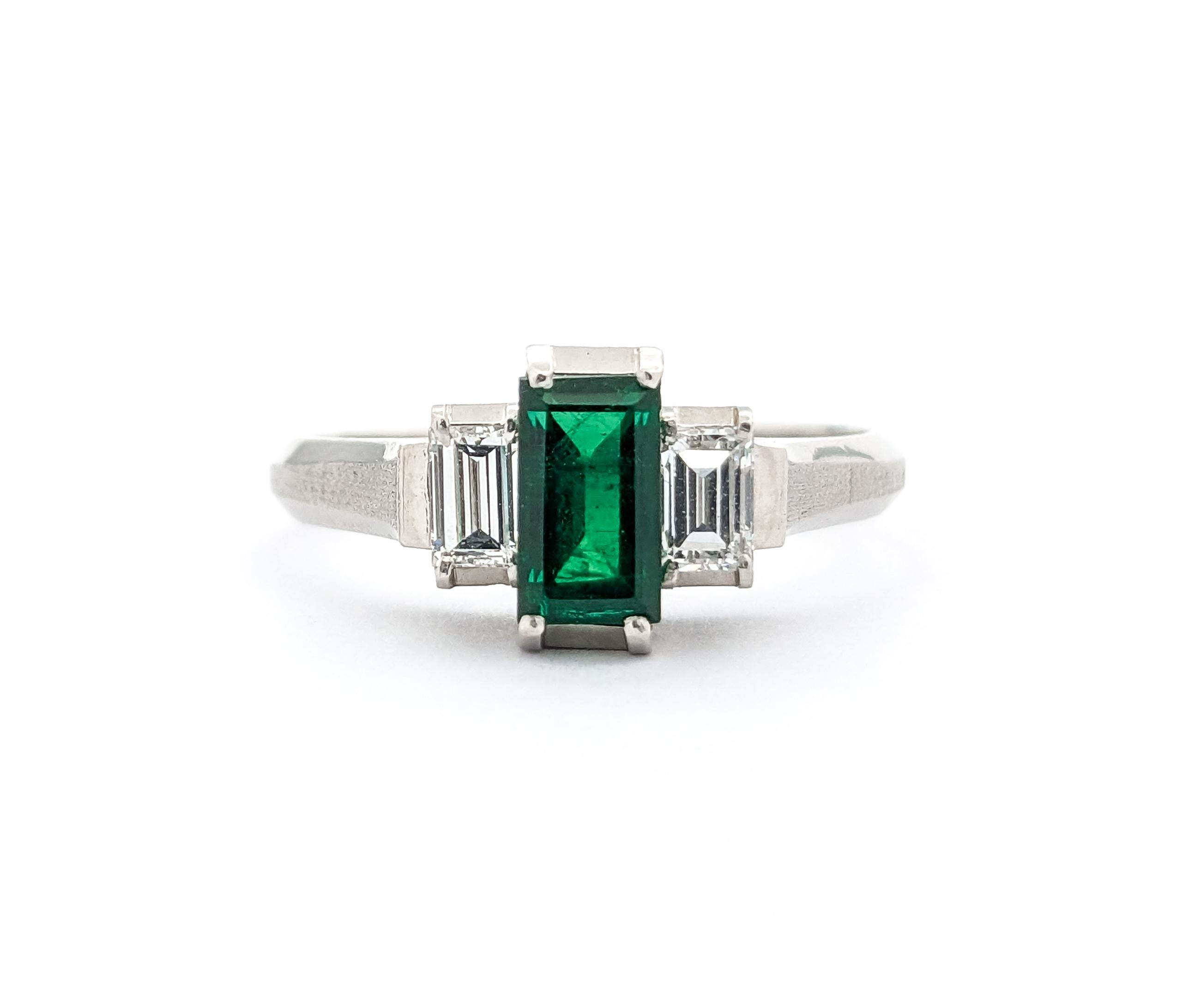 0.77ct Emerald & Diamond Ring In Platinum 9