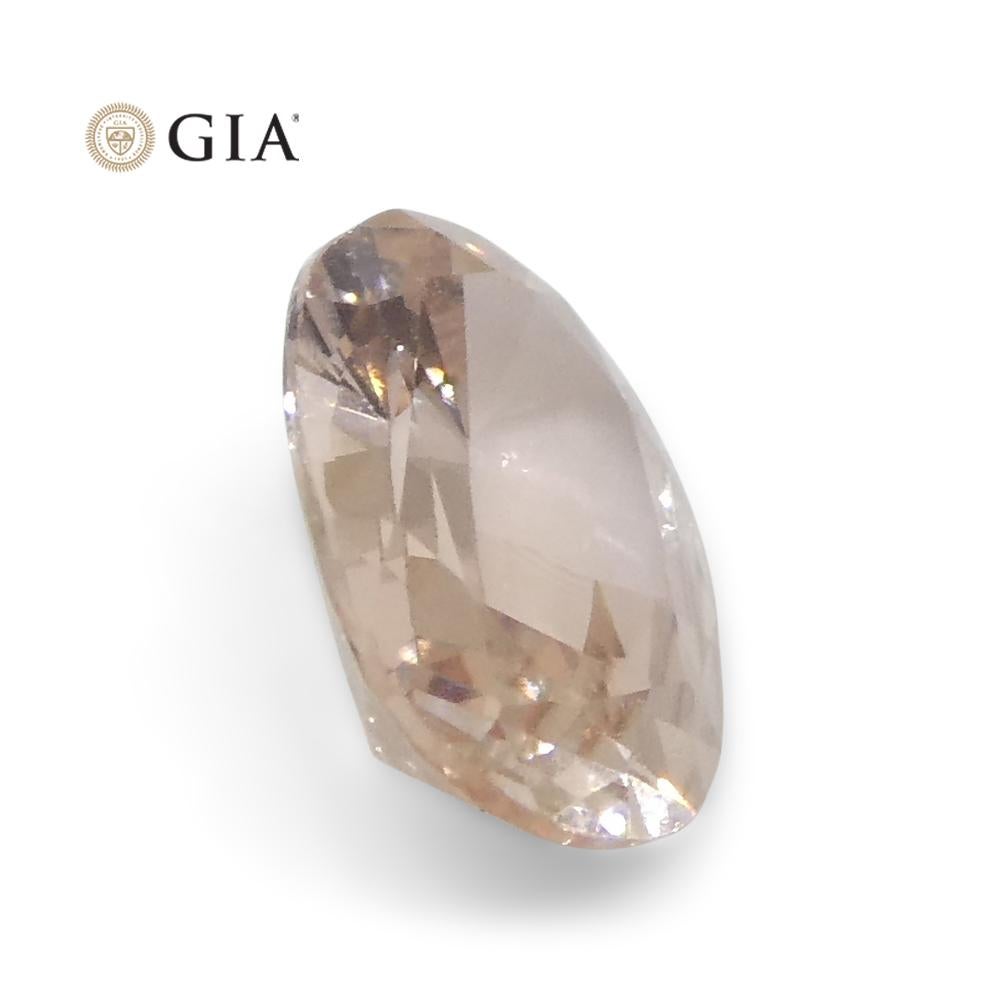 0.77 Carat Oval Orangy Pink Padparadscha Sapphire GIA Certified East Africa For Sale 5