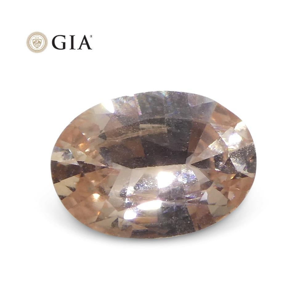 0.77 Carat Oval Orangy Pink Padparadscha Sapphire GIA Certified East Africa For Sale 6