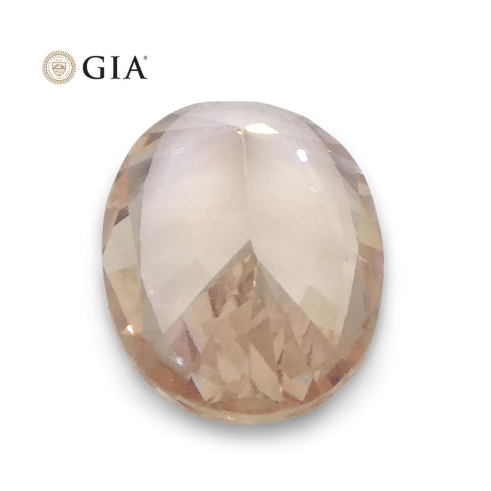0.77 Carat Oval Orangy Pink Padparadscha Sapphire GIA Certified East Africa For Sale 8