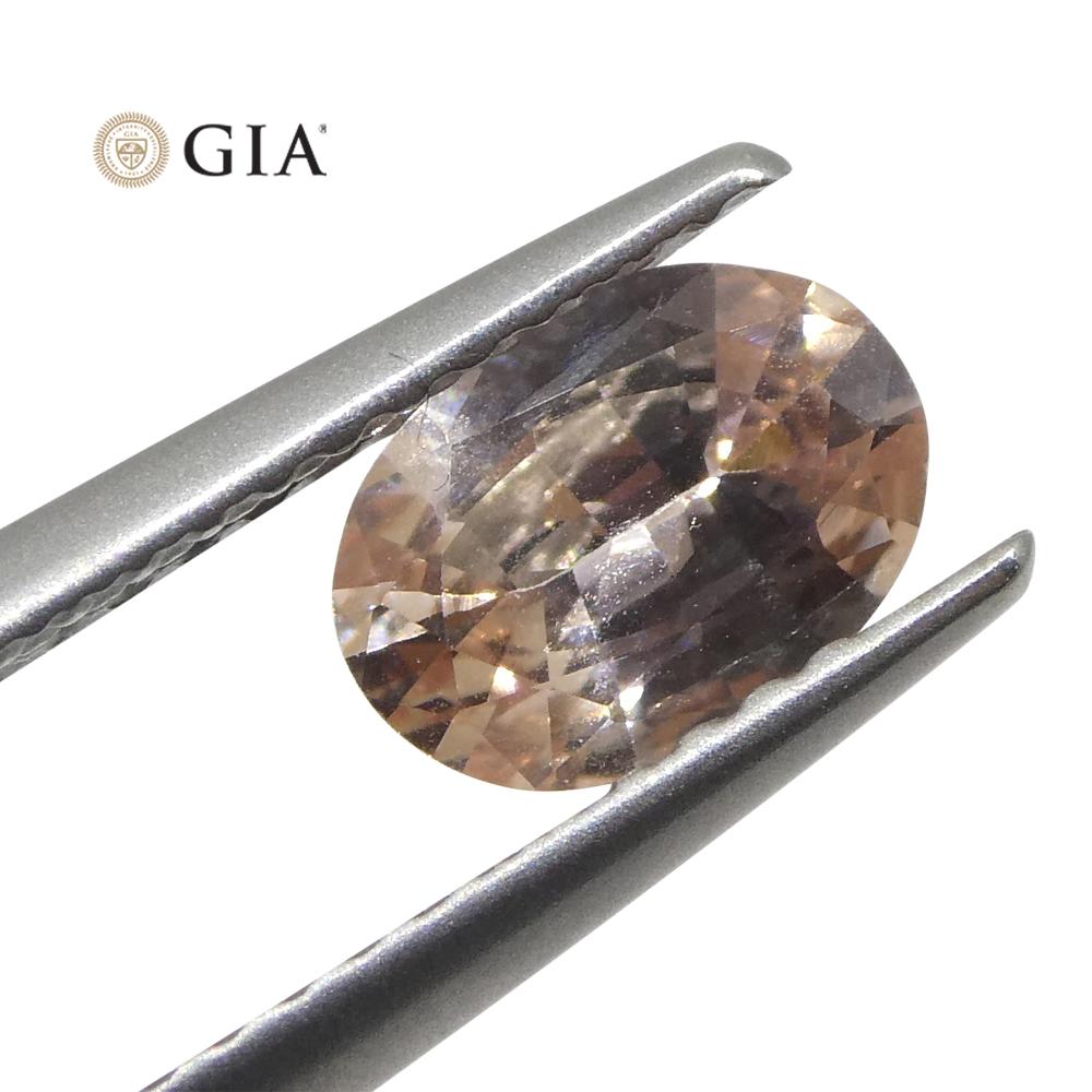0.77 Carat Oval Orangy Pink Padparadscha Sapphire GIA Certified East Africa For Sale 9