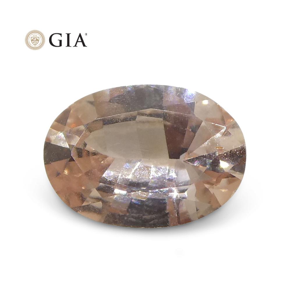 0.77 Carat Oval Orangy Pink Padparadscha Sapphire GIA Certified East Africa For Sale 2