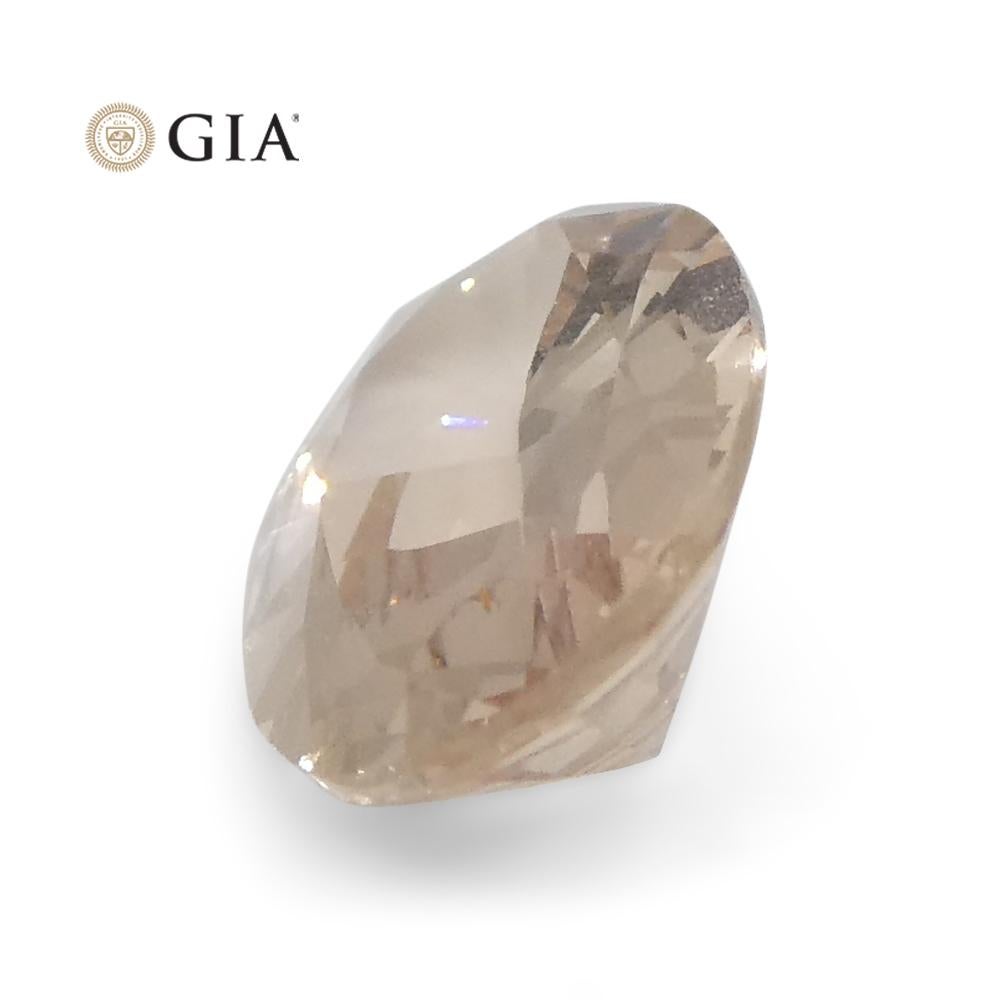 0.77 Carat Oval Orangy Pink Padparadscha Sapphire GIA Certified East Africa For Sale 3