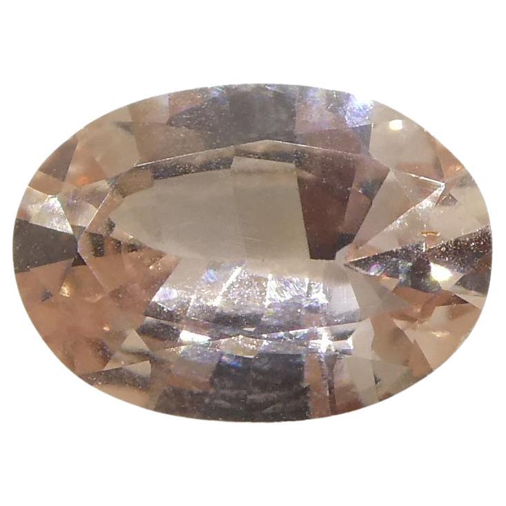 0.77 Carat Oval Orangy Pink Padparadscha Sapphire GIA Certified East Africa For Sale