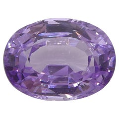 Zafiro púrpura ovalado de Madagascar sin calentar de 0.77 ct