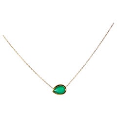0.77ct Pear Shape Emerald Pendant – 18ct Yellow Gold Halo Design