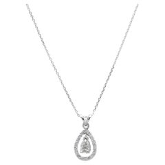 0.77ct Pear Shaped Diamond Pendant with Halo in 14k White Gold