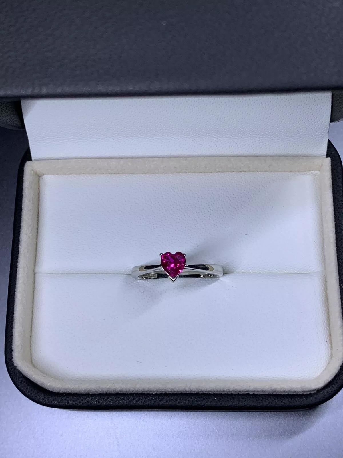 0.77ct Ruby heart engagement ring in platinum.