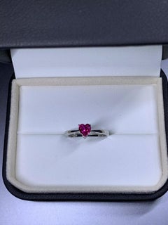 0.77ct Ruby heart engagement ring in platinum.